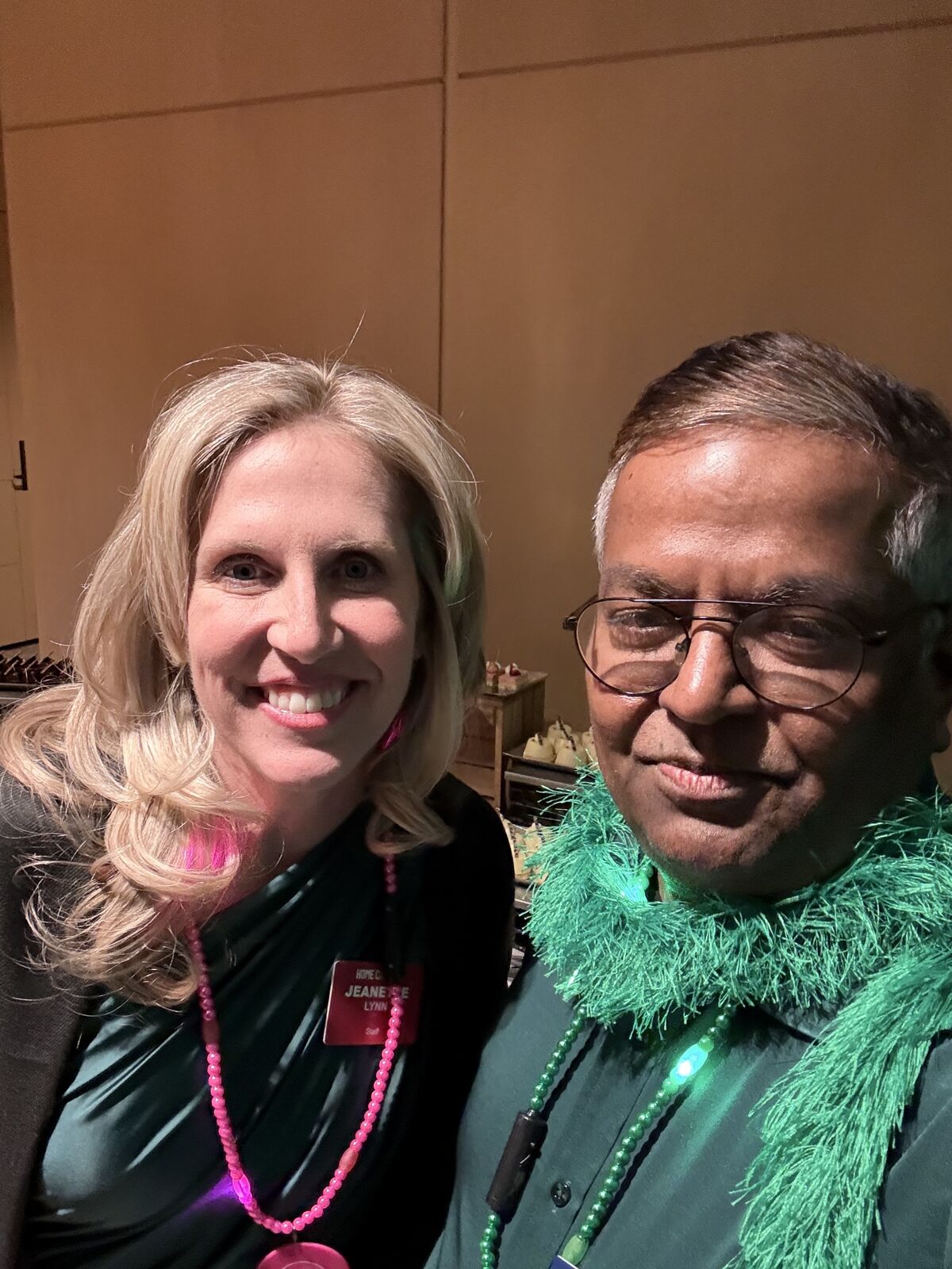 Krishna with another attendee at the themed dinner